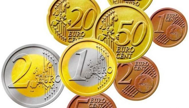 România continuă demersurile pentru trecerea la moneda euro