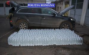 Un hectolitru de alcool netimbrat, confiscat de poliţiştii mureşeni